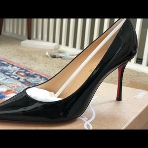 Authentic never worn Louboutin patent black heels